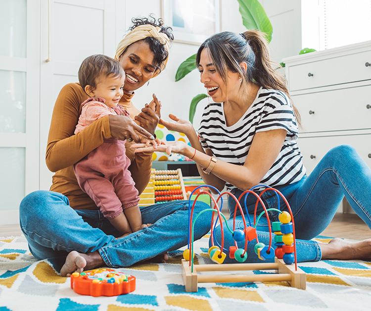 Parents playing with their child