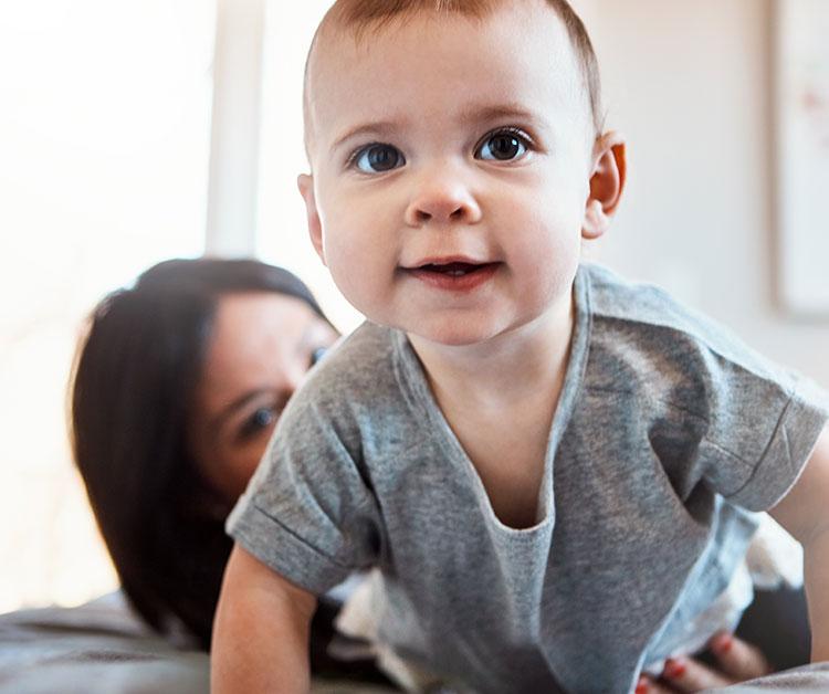Mom with baby on tummy