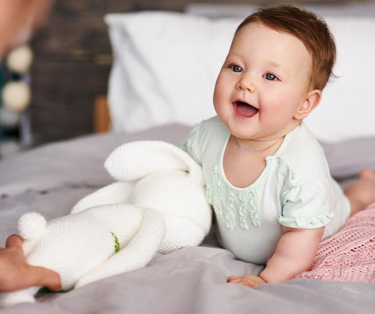 Baby playing with a toy