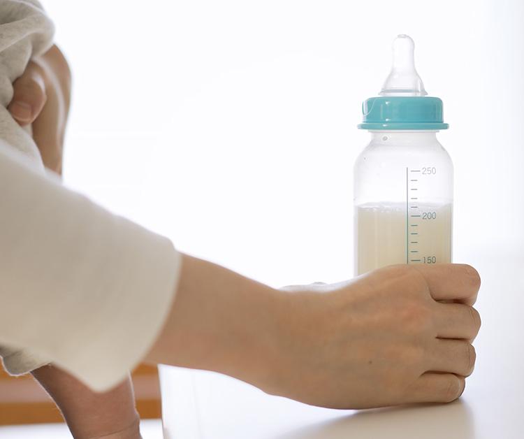 Mom holding a bottle