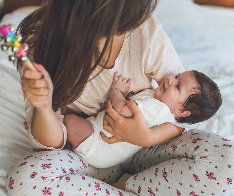 Mother holding her baby